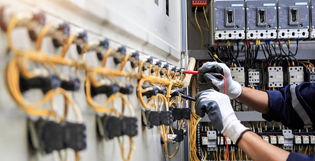 Professional Electrician technician working in Roland, IA